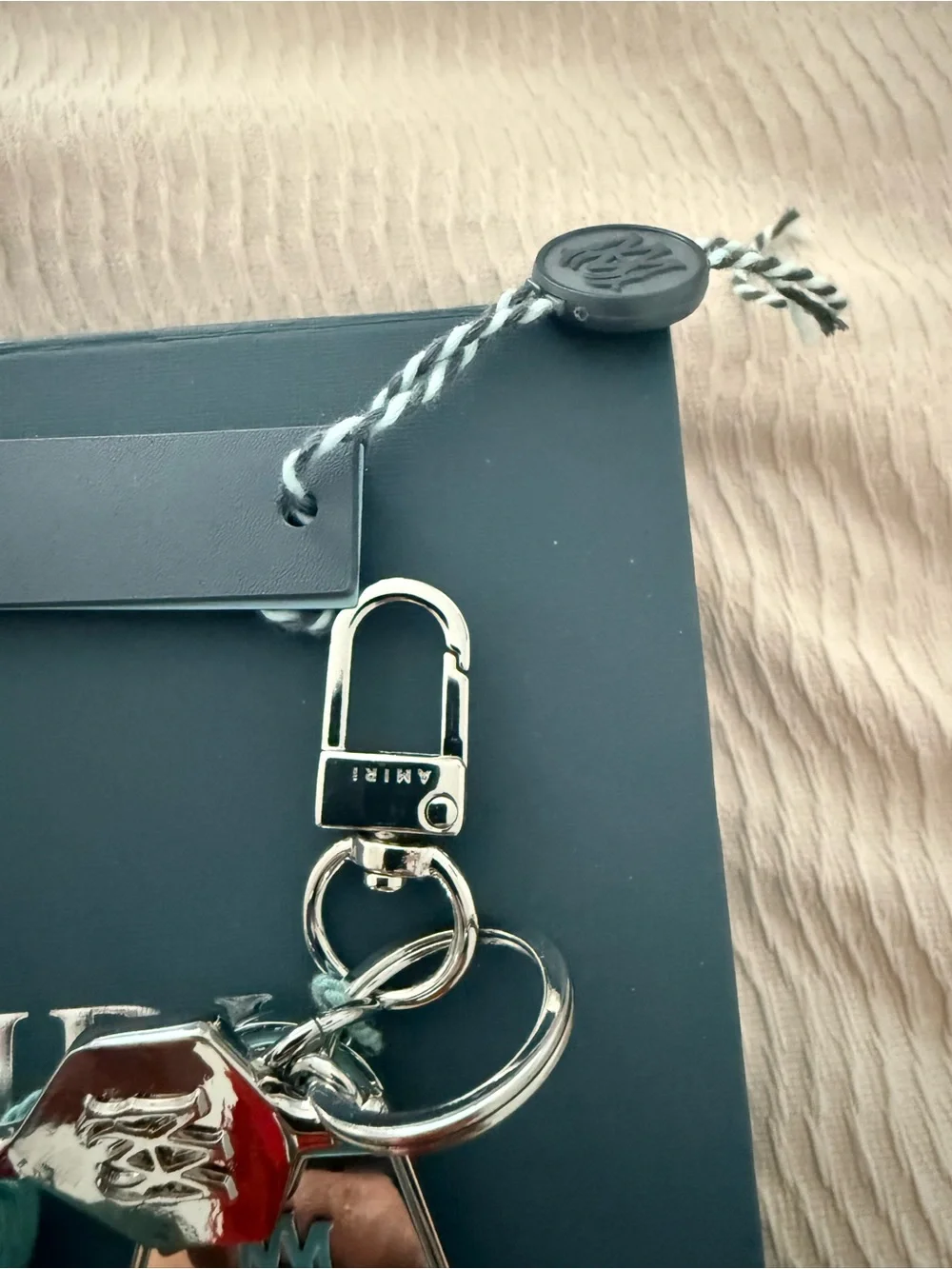 Authentic Amiri Charm And Keychain In Silver Color